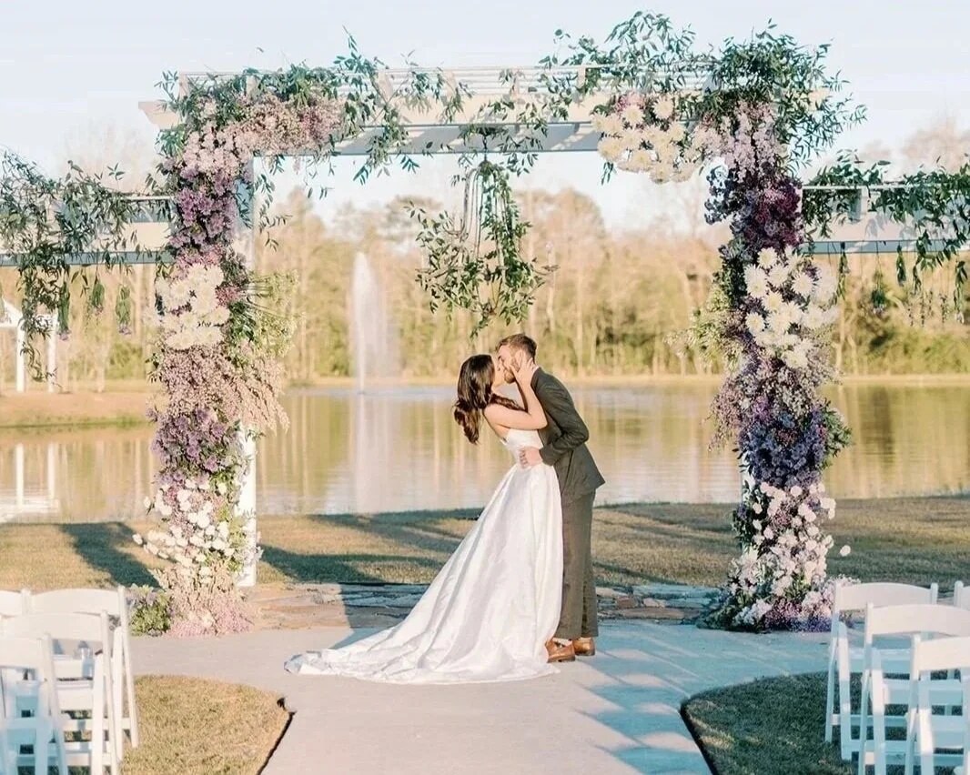Purple wedding ceremony arch in The Woodlands, TX