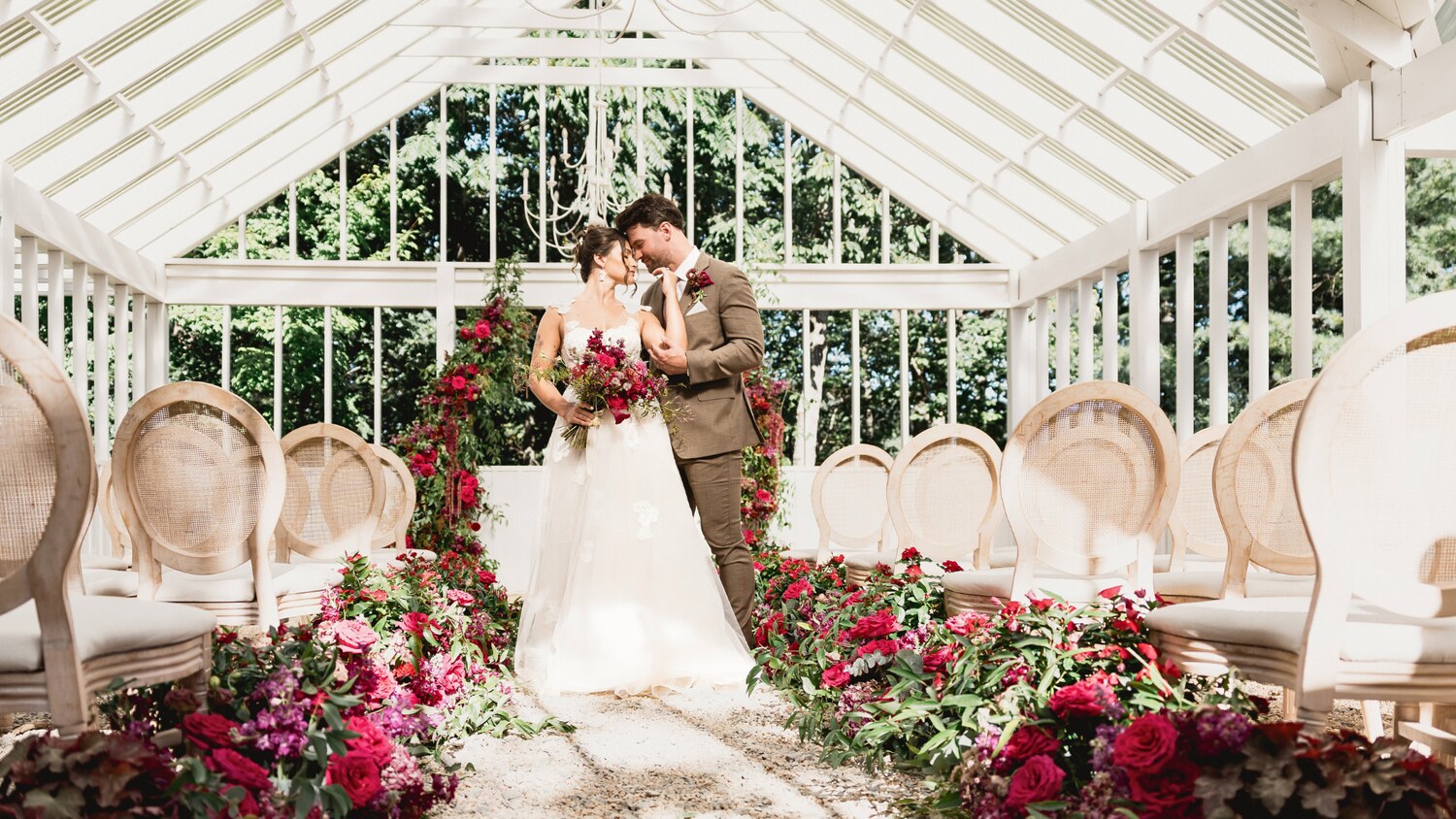 Editorial wedding ceremony aisle floral design