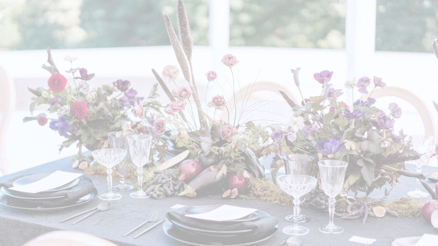 Elegant dark tablescape by Fashionable Florist